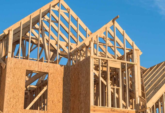 Structure of a new home being built with a construction loan.