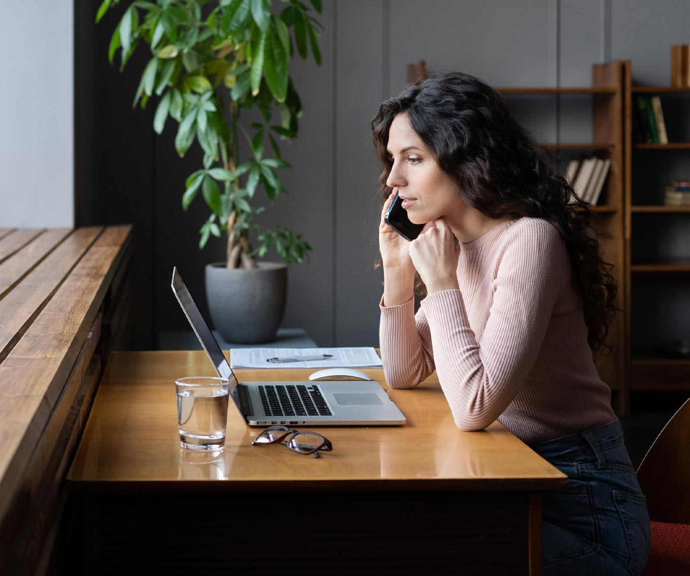 Woman on the phone looking into 2-1 buydown options